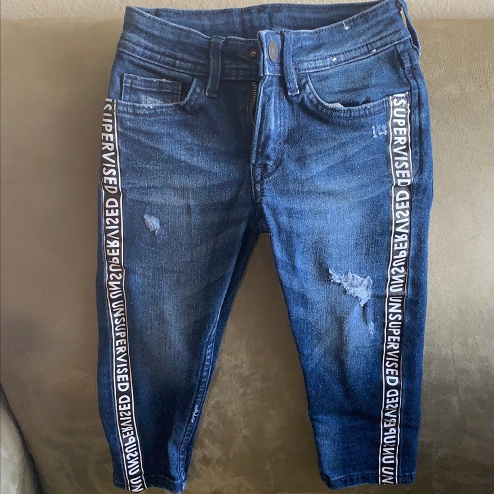 Ripped, dark wash denim
